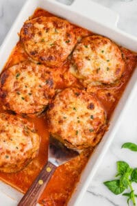 Golden-brown baked eggplant Parmesan in a 9 x 13 baking dish.