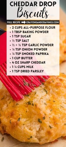 Collage pin featuring close-up cheddar biscuits in the background with a recipe card overlay listing ingredients like flour, cheddar, butter, milk, and spices. Text includes “Cheddar Drop Biscuits” and “Full Recipe → crayonsandcravings.com.”