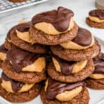 Stack of buckeye cookies on a plate.