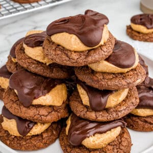 Stack of buckeye cookies on a plate.