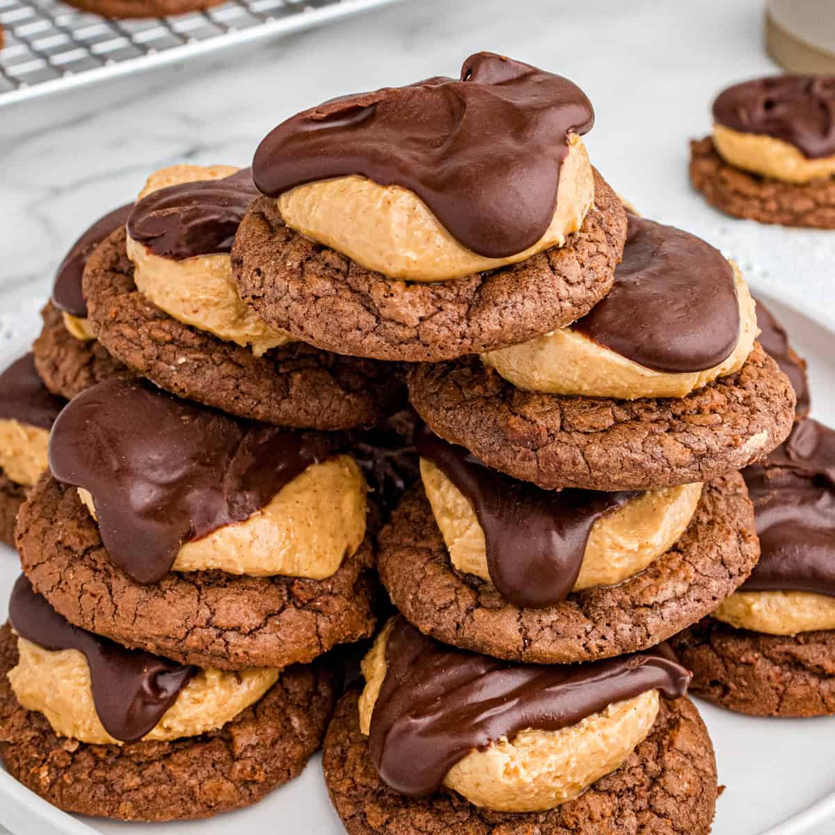 Stack of buckeye cookies on a plate.