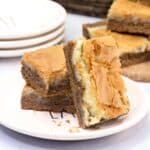 Harvest spice bars with layers of spice cookie, cream cheese, and a flakey crust.