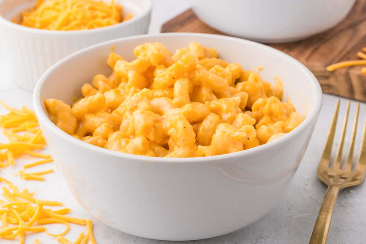 Bowl of velveeta mac and cheese made in a crock pot.