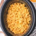 Creamy macaroni and cheese in a slow cooker.