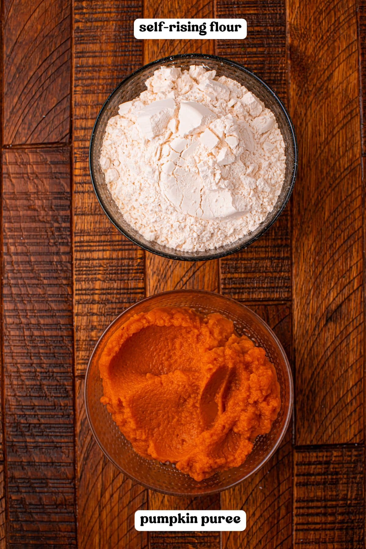 Labeled bowls of flour and pumpkin puree. Text reads "self-rising flour" and "pumpkin puree"