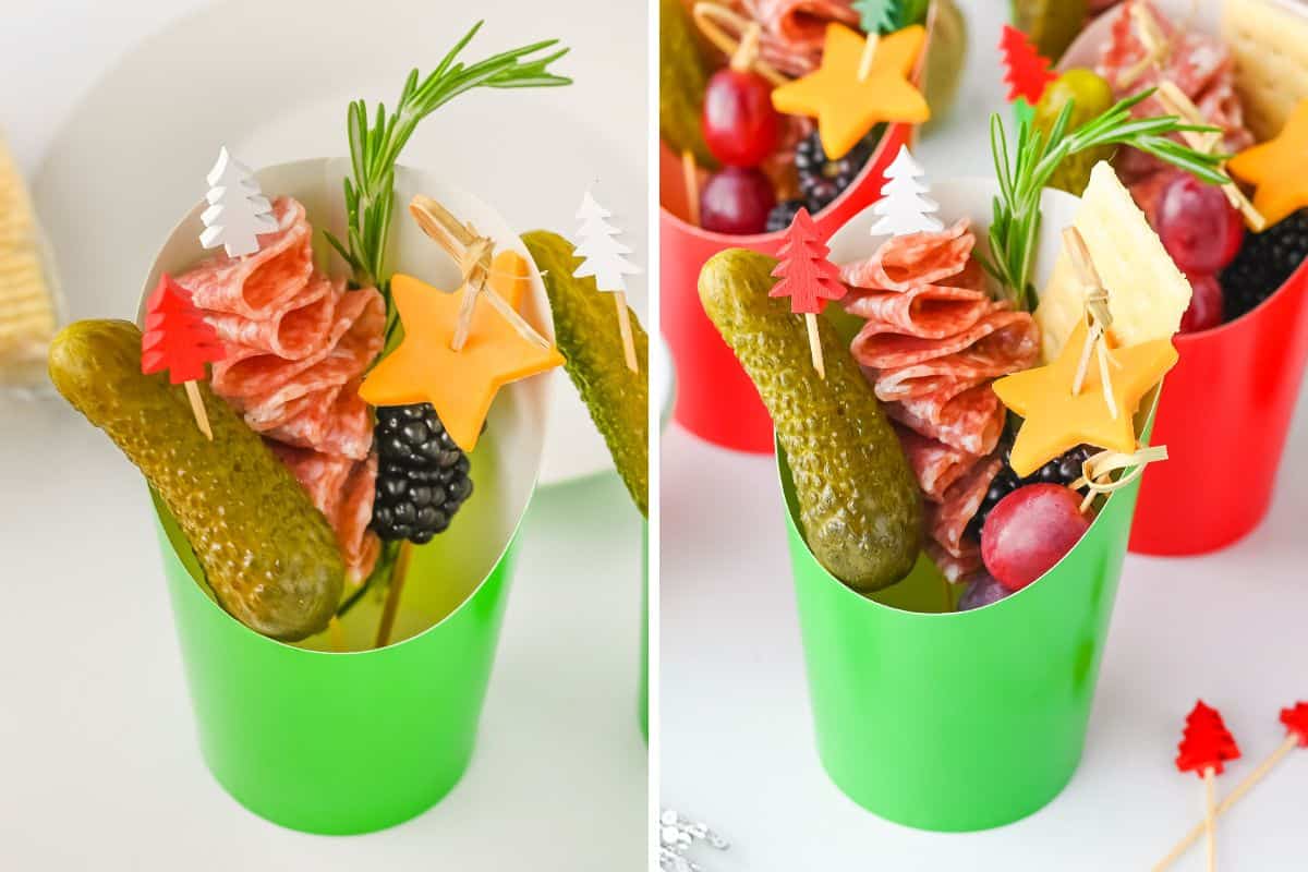 Christmas charcuterie cups with festive picks, showing items being added.