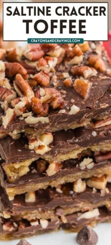 A close-up of chocolate-covered saltine cracker toffee topped with chopped pecans. The text at the top reads &ldquo;Saltine Cracker Toffee&rdquo; with the website &ldquo;crayonsandcravings.com&rdquo; below.