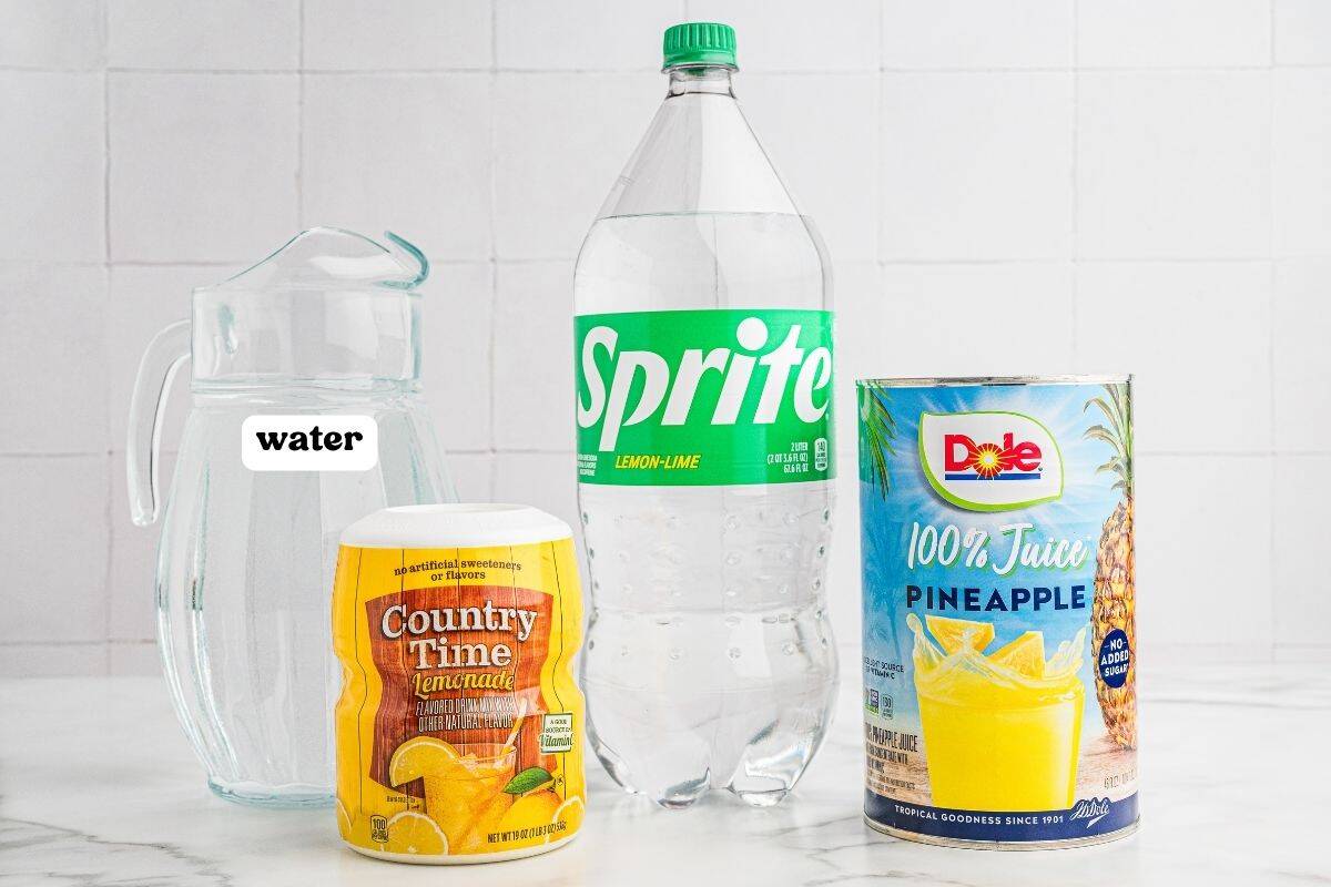 Ingredients for pineapple lemonade punch: a pitcher labeled water, Country Time lemonade mix, a bottle of Sprite, and a can of pineapple juice.